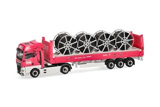 Herpa H0 MAN eTGX GX 40' Flatrackcontainer-Sattelzug mit Kabeltrommeln, ONE